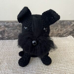 Handmade crocheted sitting Schnauzer dog